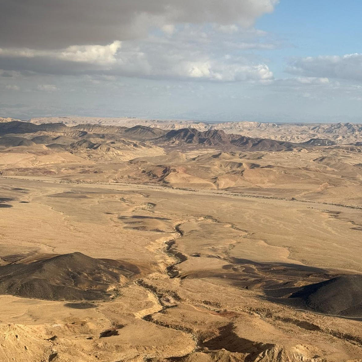 Listening from mobile during escapade prep heading south cause of sirens photo by Nathalie